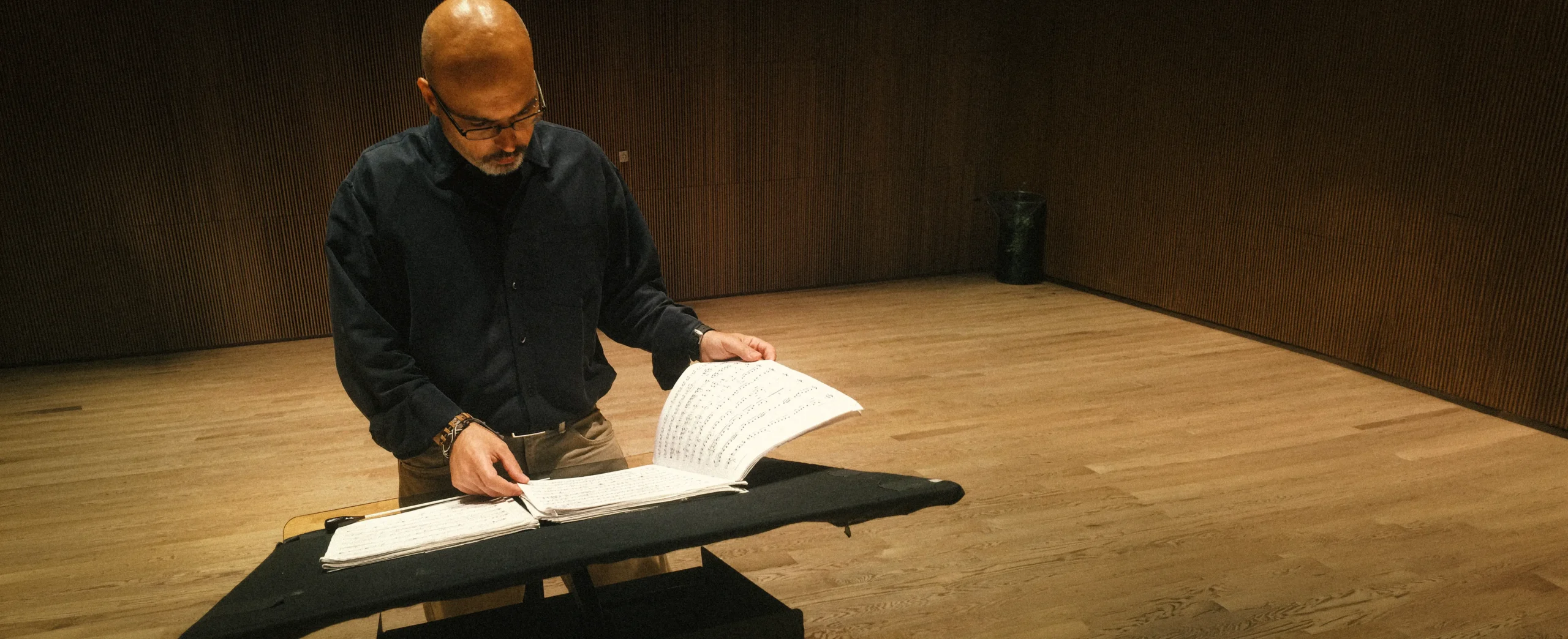 Rolando Gori reviewing an orchestral score